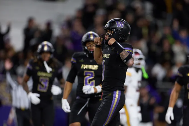 Sep 26, 2026; Seattle, Washington, USA;  Washington Huskies quarterback Demond Williams Jr. (1) celebrates after rushing for a touchdown in the fourth quarter at Husky Stadium.  Mandatory Credit: Richard Dizon-Imagn Images