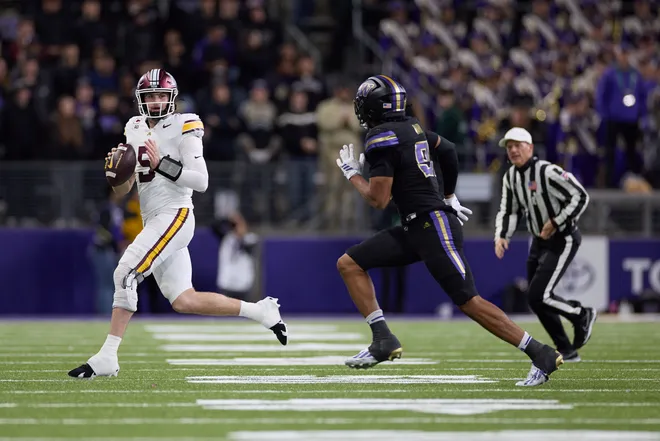Sep 26, 2026; Seattle, Washington, USA;  Minnesota Golden Gophers quarterback Drake Lindsey (5) looks to pass against the Washington Huskies during the fourth quarter at Husky Stadium.  Mandatory Credit: Richard Dizon-Imagn Images