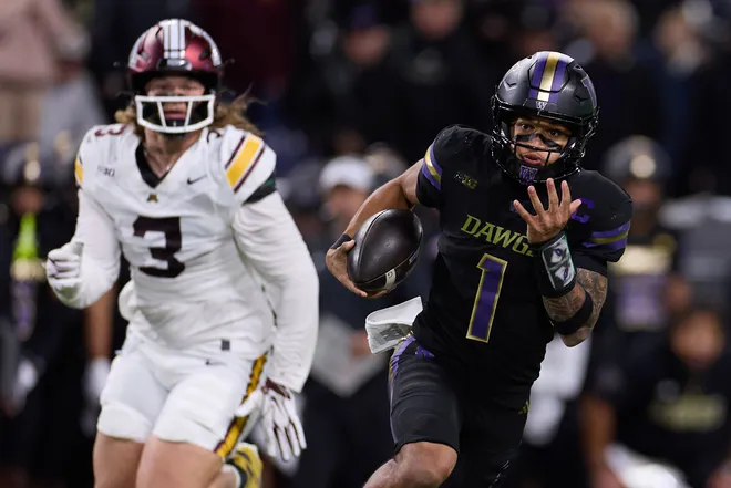 Sep 26, 2026; Seattle, Washington, USA;  Washington Huskies quarterback Demond Williams Jr. (1) rushes for a touchdown against the Minnesota Golden Gophers during the fourth quarter at Husky Stadium.  Mandatory Credit: Richard Dizon-Imagn Images