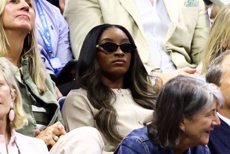 US gymnast Simone Biles watches the women's singles quarter-final tennis match between USA's Jessica Pegula and USA's Emma Navarro on day ten of the US Open tennis tournament at the USTA Billie Jean King National Tennis Center in New York City on September 8, 2026. (Photo by CHARLY TRIBALLEAU / AFP)