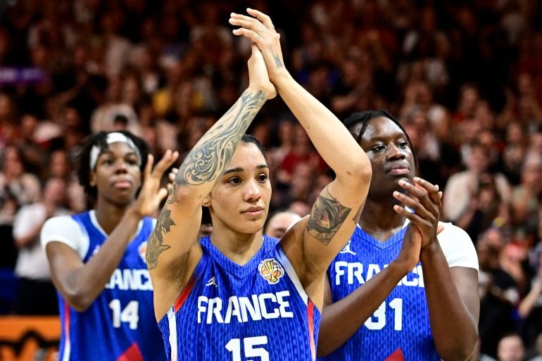 France's forward #15 Gabby Williams reacts after the 2026 FIBA Womens Basketball World Cup final game between the United States and France in Berlin on September 13, 2026. (Photo by Tobias SCHWARZ / AFP)