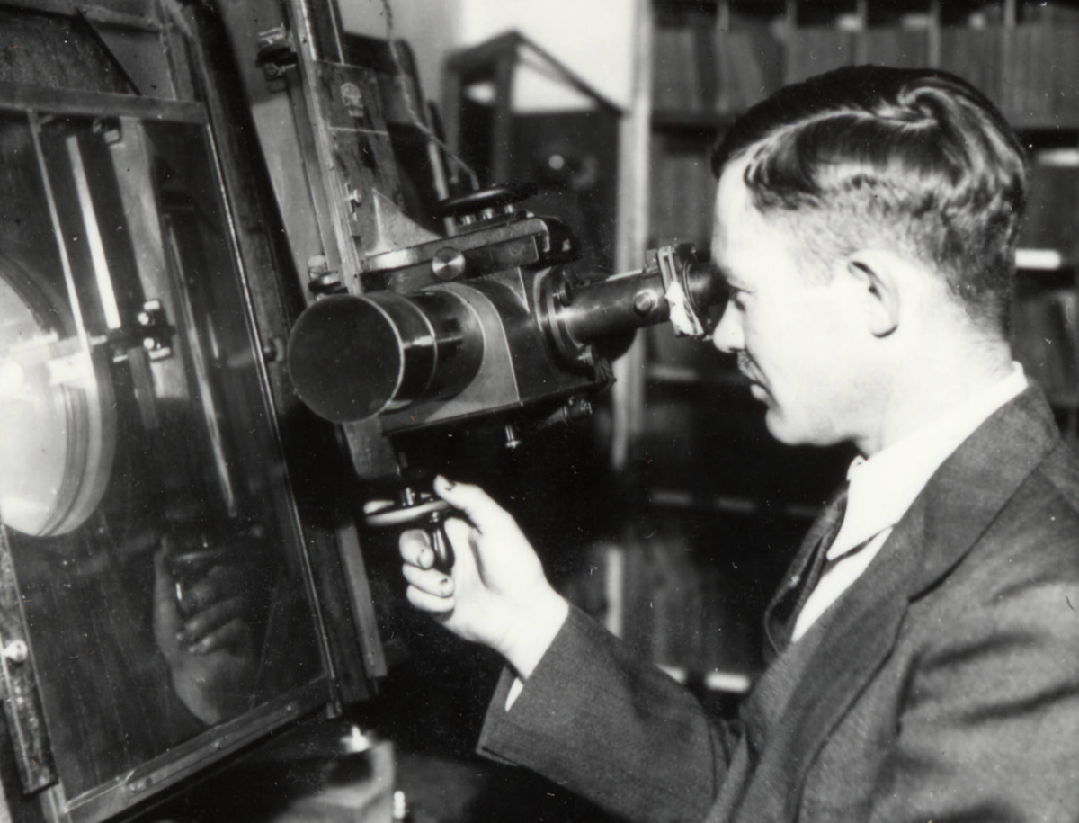 Clyde Tombaugh pictured at a Zeiss Blink Comparator, a machine used in the discovery of Pluto at Lowell Observatory in Flagstaff, Arizona, USA. Credit: Lowell Observatory Archives