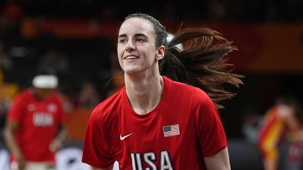 Caitlin Clark stands during the Women's FIBA World Cup 2026 game between USA and China in Berlin, Germany.