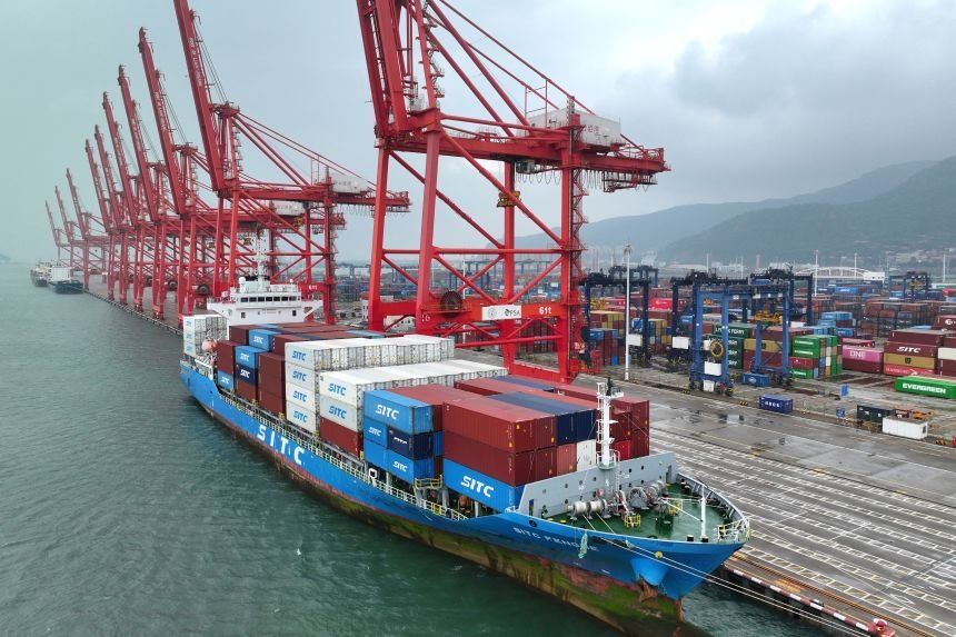 A container ship is seen at the port in Lianyungang, in China's eastern Jiangsu province on Tuesday, July 14.