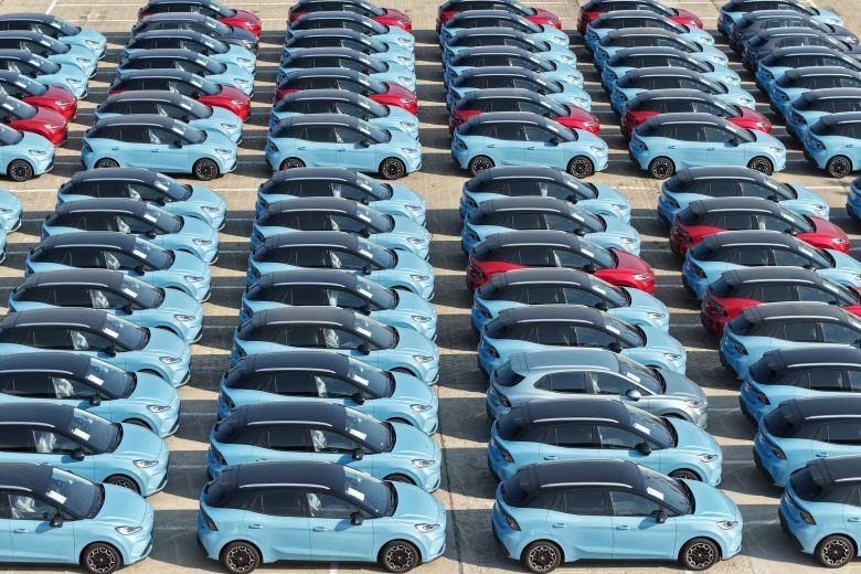 MG4 EV electric vehicles manufactured by SAIC are waiting to be loaded onto a ship for export at a car yard in Yantai, Shandong Province, China on September 18.