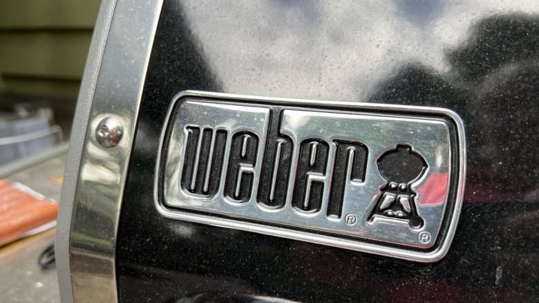 The Weber logo featured on a Weber BBQ grill