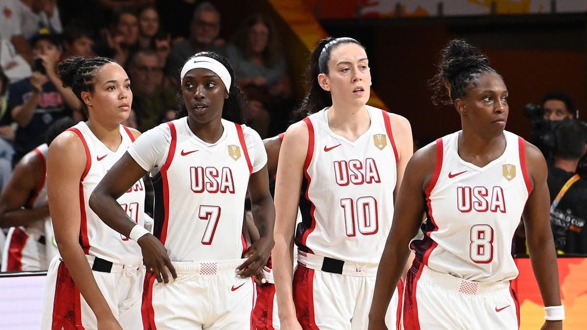 Napheesa Collier, Kahleah Copper, Breanna Stewart and Chelsea Gray of USA look on during a Women's Basketball World Cup game.