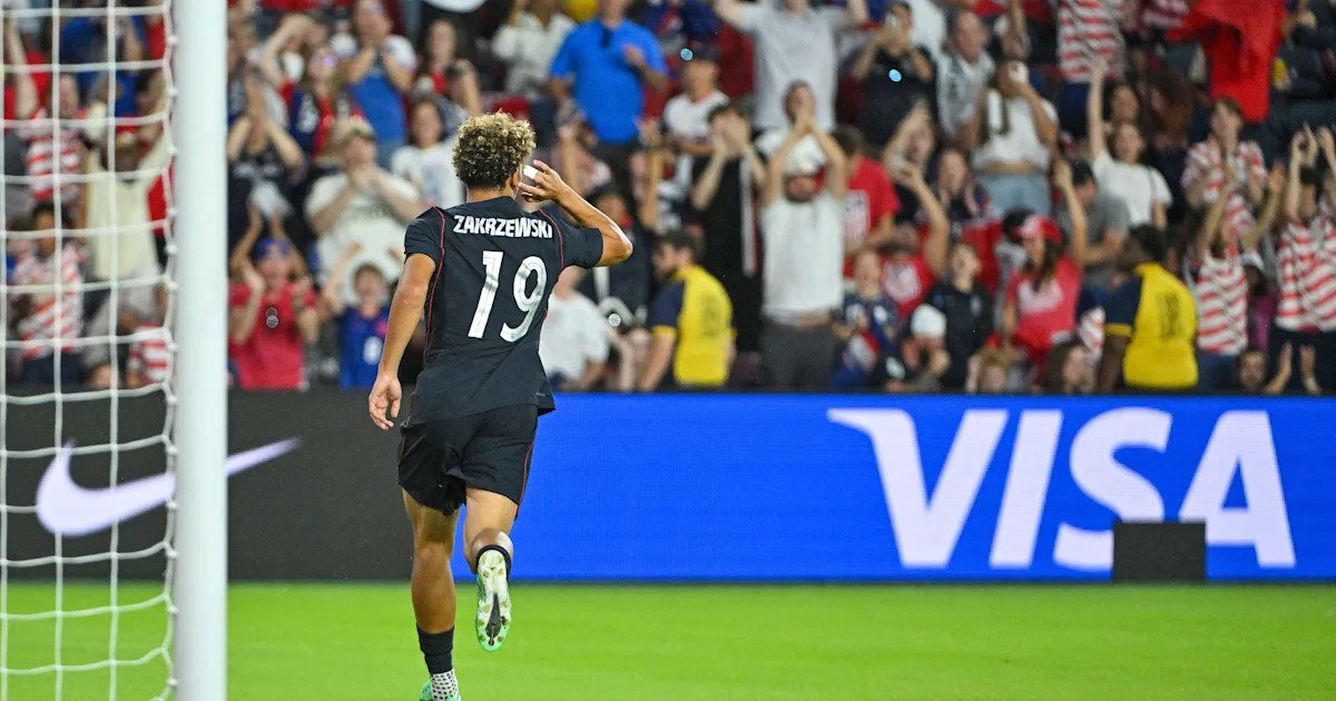 Why does USMNT forward Julian Hall wear 'Zakrzewski' on his jersey?