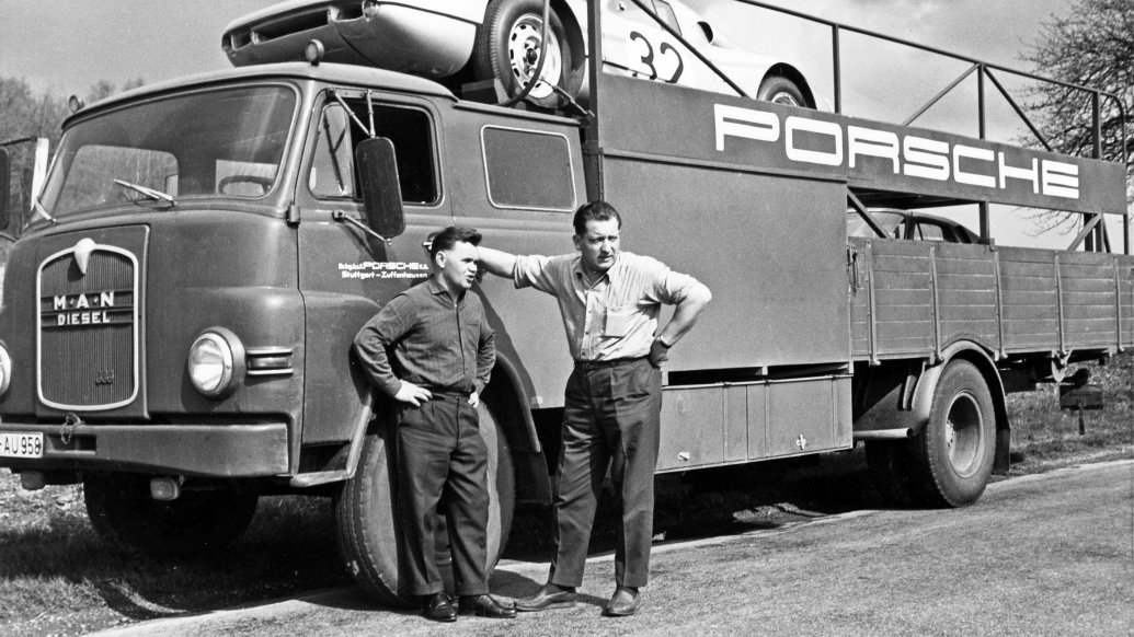 Valentin Schäffer and Karl Dubies (l-r), on the way to the pretraining at Le Mans, on the van a 904, 1964, Porsche AG