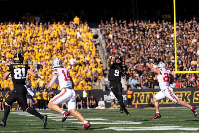 Iowa Hawkeyes quarterback Hank Brown (9) throws a pass against the Ohio State Buckeyes at Kinnick Stadium in Iowa City, Iowa, Iowa, on Oct. 3, 2026.