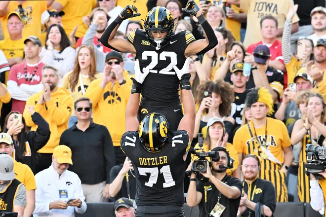 Oct 3, 2026; Iowa City, Iowa, USA;  Iowa Hawkeyes running back Braeden Jackson (22) celebrates with offensive line Jack Dotzler (71) after scoring a touchdown against the Ohio State Buckeyes during the second half at Kinnick Stadium.  Mandatory Credit: Jeffrey Becker-Imagn Images