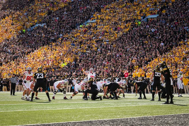 Ohio State Buckeyes quarterback Julian Sayin (10) motions during the NCAA football game against the Iowa Hawkeyes at Kinnick Stadium in Iowa City on Oct. 3, 2026.