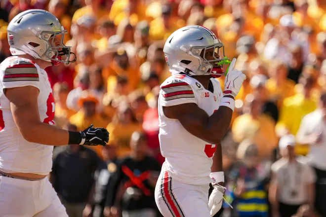 Ohio State Buckeyes wide receiver Devin McCuin (3) reacts after scoring a touchdown during the NCAA football game against the Iowa Hawkeyes at Kinnick Stadium in Iowa City on Oct. 3, 2026.
