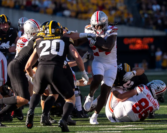 Ohio State Buckeyes running back Ja'kobi Jackson (24) carries the ball against the Iowa Hawkeyes during a Big Ten college football game Oct. 3, 2026 at Kinnick Stadium in Iowa City, Iowa.