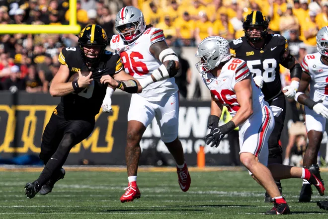 Iowa Hawkeyes quarterback Hank Brown (9) carries the ball during a Big Ten college football game against the Ohio State Buckeyes Oct. 3, 2026 at Kinnick Stadium in Iowa City, Iowa.