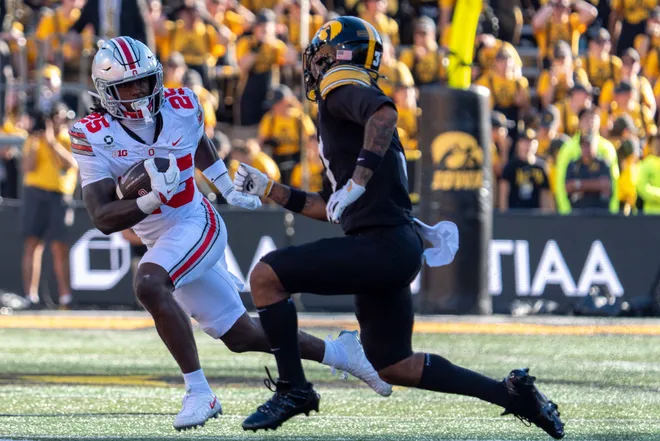 Iowa Hawkeyes defensive back Jaylen Watson (3) defedns Ohio State Buckeyes running back Bo Jackson (25) during a Big Ten college football game Oct. 3, 2026 at Kinnick Stadium in Iowa City, Iowa.