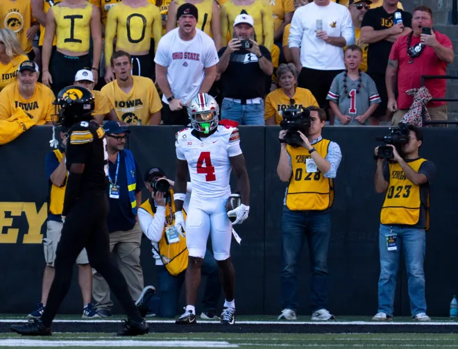 Ohio State Buckeyes wide receiver Jeremiah Smith (4) reacts after scoring a touchdown against the Iowa Hawkeyes during a Big Ten college football game Oct. 3, 2026 at Kinnick Stadium in Iowa City, Iowa.