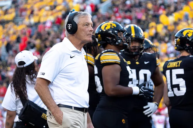 Iowa Hawkeyes head coach Kirk Ferentz is pictured during a timeout at Kinnick Stadium in Iowa City, Iowa, on Oct. 3, 2026.