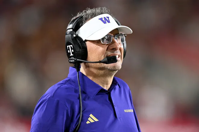 Oct 3, 2026; Los Angeles, California, USA;  Washington Huskies head coach Jedd Fisch reacts against the USC Trojans during the fourth quarter at United Airlines Field at Los Angeles Memorial Coliseum.  Mandatory Credit: Griffin Hooper-Imagn Images