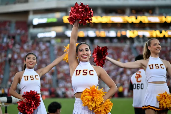Oct 3, 2026; Los Angeles, California, USA;  USC Trojans cheerleaders during the first half between the USC Trojans and the Washington Huskies at United Airlines Field at Los Angeles Memorial Coliseum.  Mandatory Credit: Griffin Hooper-Imagn Images
