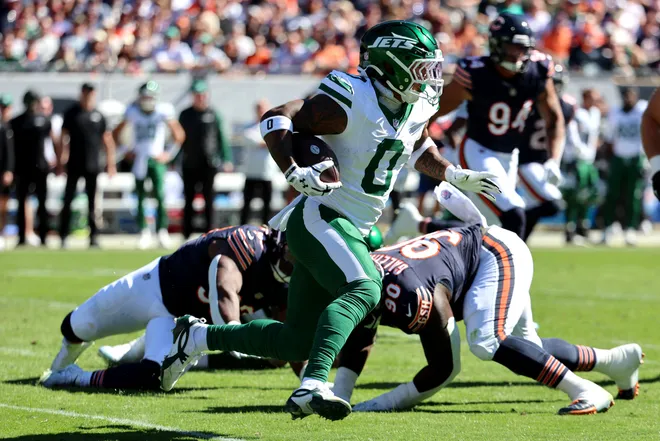 Oct 4, 2026; Chicago, Illinois, USA;  New York Jets running back Braelon Allen (0) runs with the ball against the Chicago Bears during the second quarter at Soldier Field.  Mandatory Credit: Mike Dinovo-Imagn Images