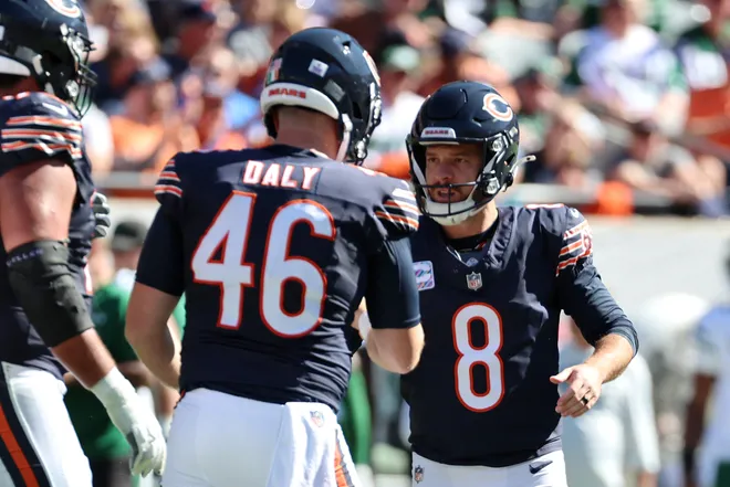 Oct 4, 2026; Chicago, Illinois, USA;  Chicago Bears kicker Cairo Santos (8) with long snapper Scott Daly (46) after kicking a field goal against the New York Jets during the second quarter at Soldier Field.  Mandatory Credit: Mike Dinovo-Imagn Images