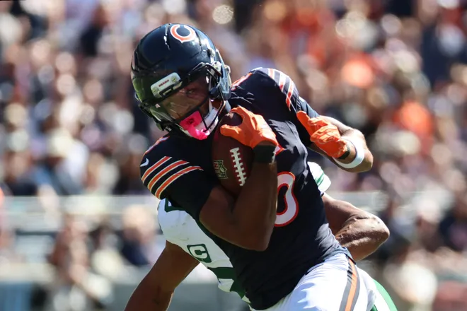 Oct 4, 2026; Chicago, Illinois, USA;  Chicago Bears wide receiver Rome Odunze (15) makes a catch against the New York Jets during the second quarter at Soldier Field.  Mandatory Credit: Mike Dinovo-Imagn Images