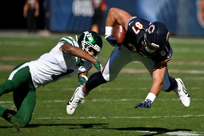 Oct 4, 2026; Chicago, Illinois, USA;  New York Jets cornerback Azareye'h Thomas (1) trips up Chicago Bears tight end Sam Roush (87) during the third quarter at Soldier Field.  Mandatory Credit: Matt Marton-Imagn Images