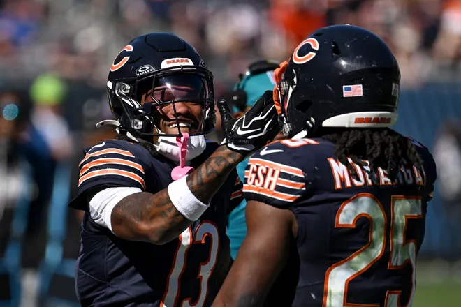 Oct 4, 2026; Chicago, Illinois, USA;  Chicago Bears running back Kyle Monangai (25) celebrates with wide receiver Zavion Thomas (13) after a touchdown against the New York Jets during the third quarter at Soldier Field.  Mandatory Credit: Matt Marton-Imagn Images