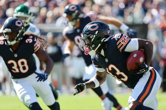 Oct 4, 2026; Chicago, Illinois, USA;  Chicago Bears wide receiver Zavion Thomas (13) returns a kickoff against the New York Jets during the third quarter at Soldier Field.  Mandatory Credit: Mike Dinovo-Imagn Images