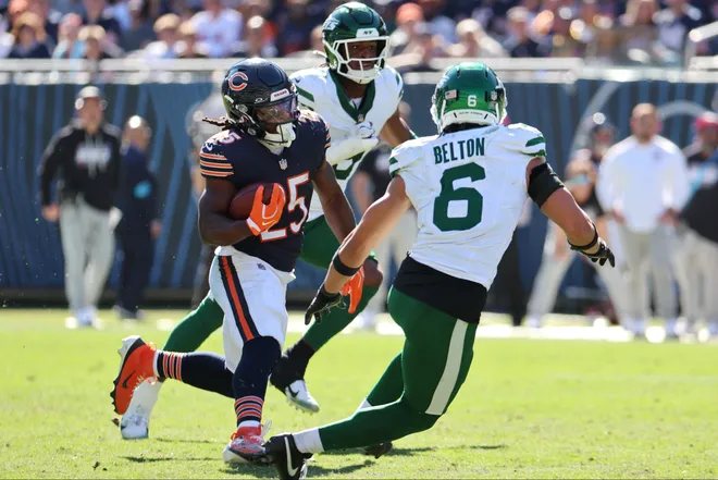 Oct 4, 2026; Chicago, Illinois, USA;  Chicago Bears running back Kyle Monangai (25) runs with the ball against New York Jets safety Dane Belton (6) during the third quarter at Soldier Field.  Mandatory Credit: Mike Dinovo-Imagn Images