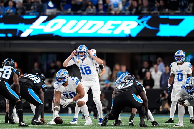Detroit Lions quarterback Jared Goff (16) signals before a play against Carolina Panthers during the first half at Bank of America Stadium in Charlotte on Sunday, Oct. 4, 2026.