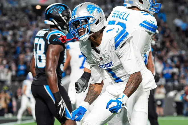 Detroit Lions wide receiver Jameson Williams (1) celebrates a first down against the Carolina Panthers during the first half at Bank of America Stadium in Charlotte on Sunday, Oct. 4, 2026.