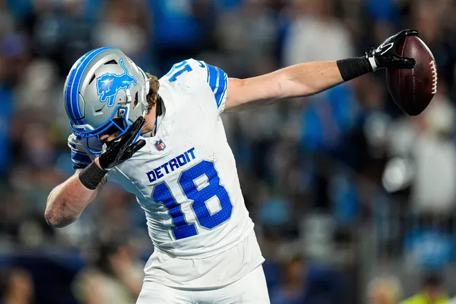 Detroit Lions wide receiver Isaac TeSlaa (18) celebrates a first down against Carolina Panthers during the second half at Bank of America Stadium in Charlotte on Sunday, Oct. 4, 2026.