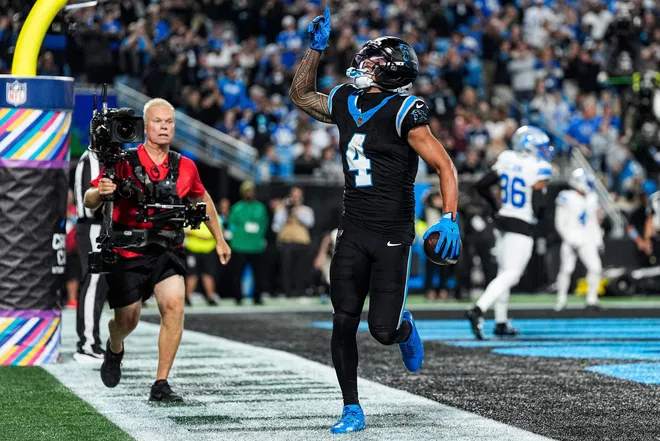 Carolina Panthers wide receiver Tetairoa McMillan (4) makes a catch for a touchdown against the Detroit Lions during the second half at Bank of America Stadium in Charlotte on Sunday, Oct. 4, 2026.