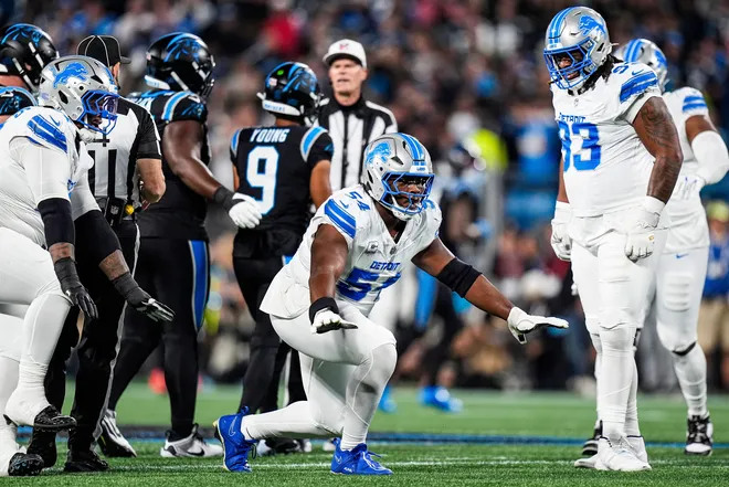 Detroit Lions defensive lineman Alim McNeill (54) celebrates a sack of Carolina Panthers quarterback Bryce Young (9) during the first half at Bank of America Stadium in Charlotte on Sunday, Oct. 4, 2026.